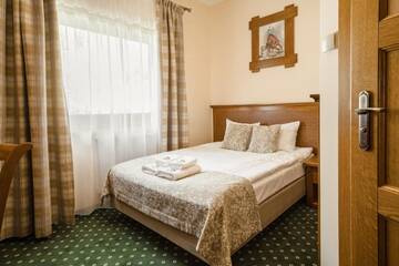 Фото номера Стандартный двухместный номер с 1 кроватью Отель Hotel Ranczo Smyczyna г. Smyczyna 6