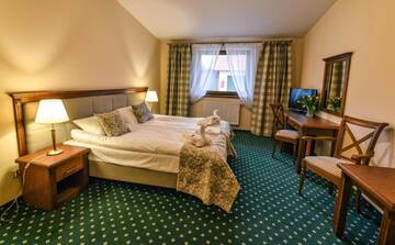 Фото номера Улучшенный семейный номер Отель Hotel Ranczo Smyczyna г. Smyczyna 6